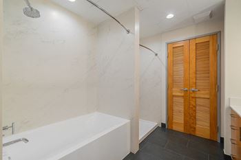 Separate tub and walk-in shower*